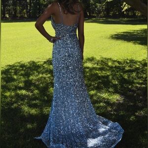 Baby blue prom dress worn once in great condition also comes with the corsages